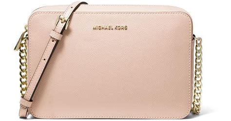 michael kors jet set travel crossbody bag pale pink|Michael Kors studded crossbody bag.